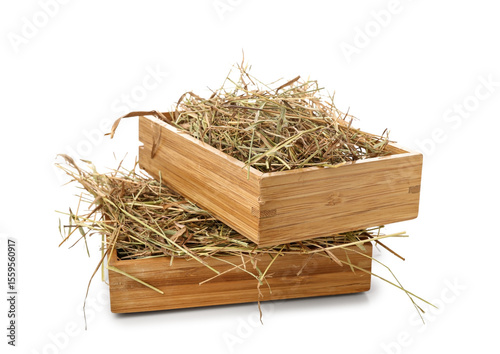 Straw in crates on white ba...