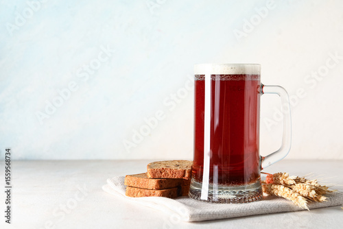 Refreshing dark beer mug wi...