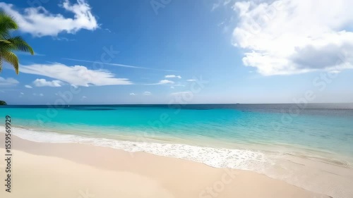 Waves gently lap the white sand of a Caribbean beach beneath swaying palm trees and a sunny, blue sky with scattered clouds.