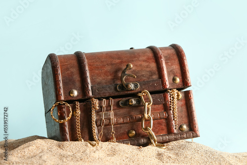 Old chest with treasures on...