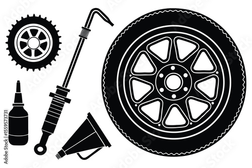 Black silhouette automotive tire and tools wheel lug nuts