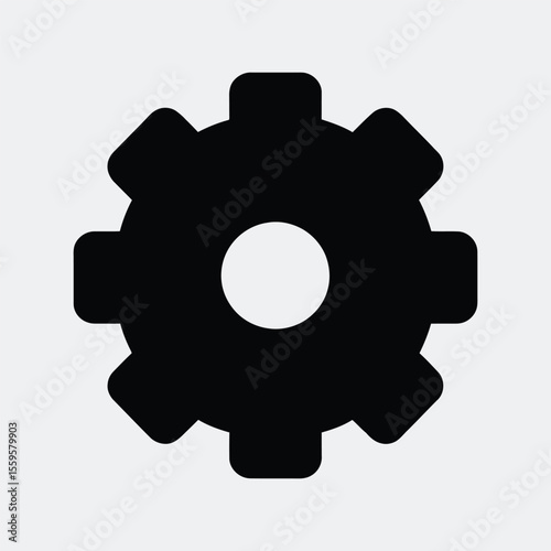 Simple black silhouette of a cogwheel with a central circular opening against a light gray background