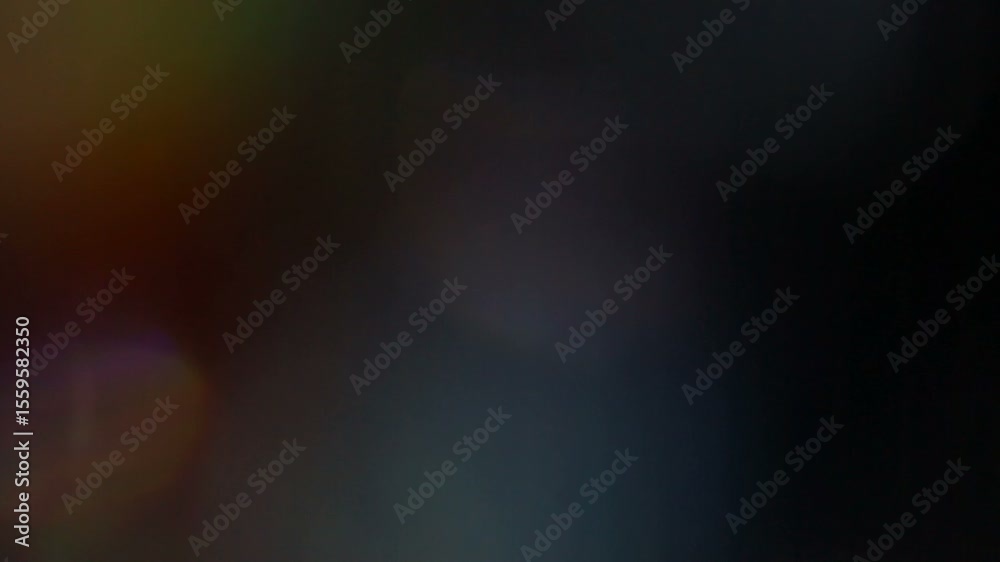 A beautiful, organic, and cinematic light leak and lens flare overlay with colorful rainbow refractions, perfect for adding a dreamy, vintage, or atmospheric effect A beautiful, organic, and cinematic light leak and lens flare overlay with colorful rainbow refractions, perfect for adding a dreamy, vintage, or atmospheric effect