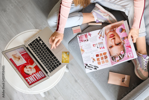 Woman with beauty magazine ...