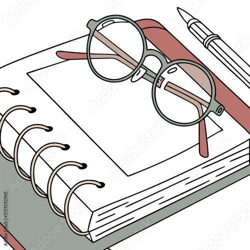 A pair of round eyeglasses rests on an open spiral bound notebook next to a pen suggesting study or work preparation