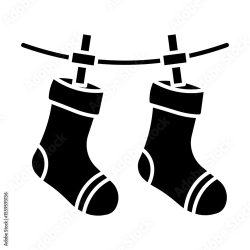 Made in UK Laundry day delight two socks drying on a clothesline vector icon solid style.