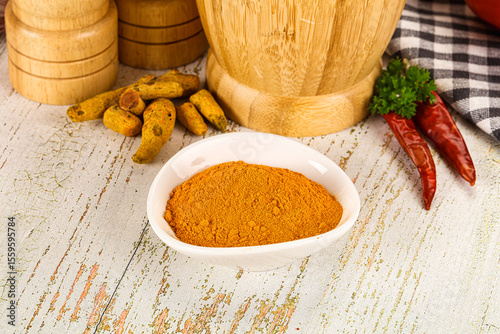 Fototapeta Naklejka Na Ścianę i Meble -  Tumeric curcuma powder for culinary