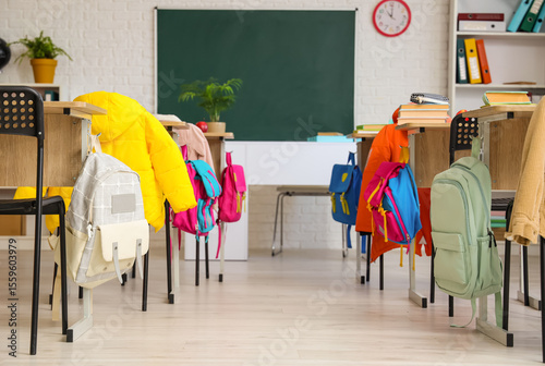 Pupil's desks with backpack...