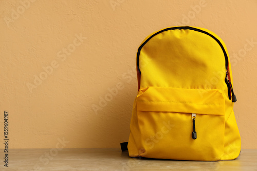 Bright yellow backpack for ...