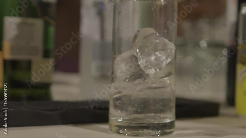 Wallpaper Mural closeup shot of adding ice cubes in Glass. Torontodigital.ca