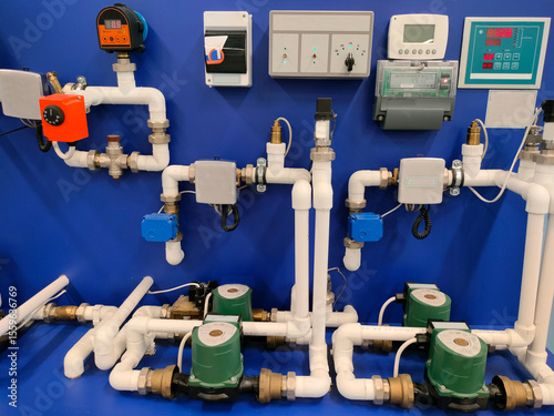 The control panel of the water supply system, with switches and indicators.