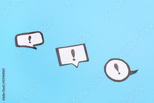Speech bubbles with exclamation marks on color background