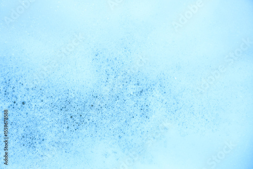 Detergent foam bubbles on a water with cleaning or washing, Close up of soap bubbles