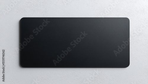 Minimalist black fabric mousepad mockup on white background — top view of large, matte, ergonomic desktop accessory for branding, design, or gaming workspace presentation