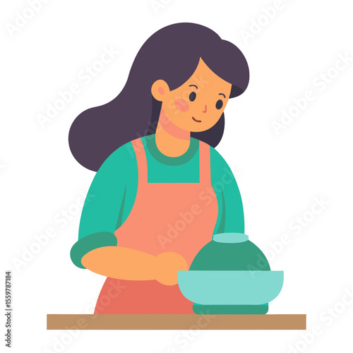 Young woman wearing an apron preparing food in a bowl