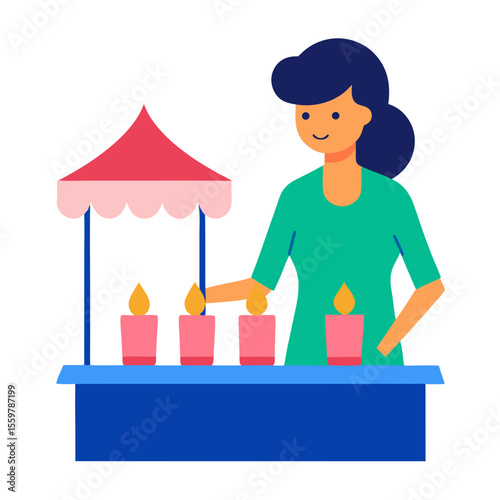 Woman lighting candles at a festive stall with a decorative canopy