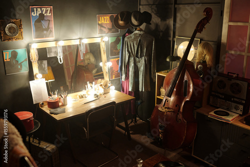 Photography Musicians dressing room featuring upright bass, vintage reel-to-reel tape record