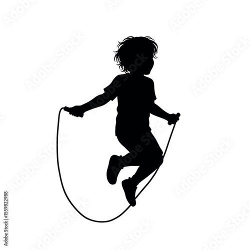 silhouette of a boy jumping on rope