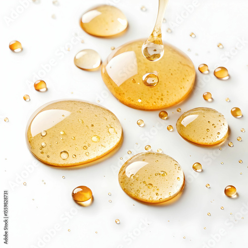 Golden, glistening honey serum drops suspended on a white background, symbolizing purity, skincare luxury, and the natural essence of nourishment.