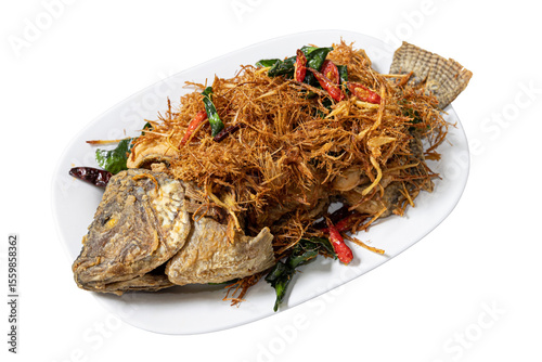 Crispy Fried Fish: An overhead shot of a delectable crispy fried fish, adorned with fresh herbs and chili peppers, served on a pristine white plate, enticing foodies and culinary enthusiasts alike.