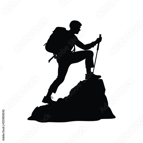 Silhouette of a hiker with backpack conquering a rocky mountain peak