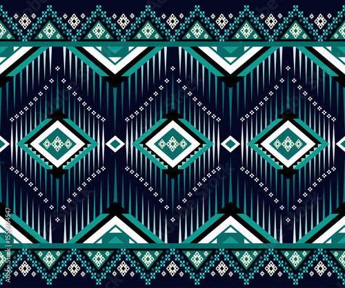 A bold and vibrant tribal pattern in emerald and teal, featuring dynamic diamond shapes and geometric arrow motifs. Perfect for textiles, fashion design, or cultural art prints.