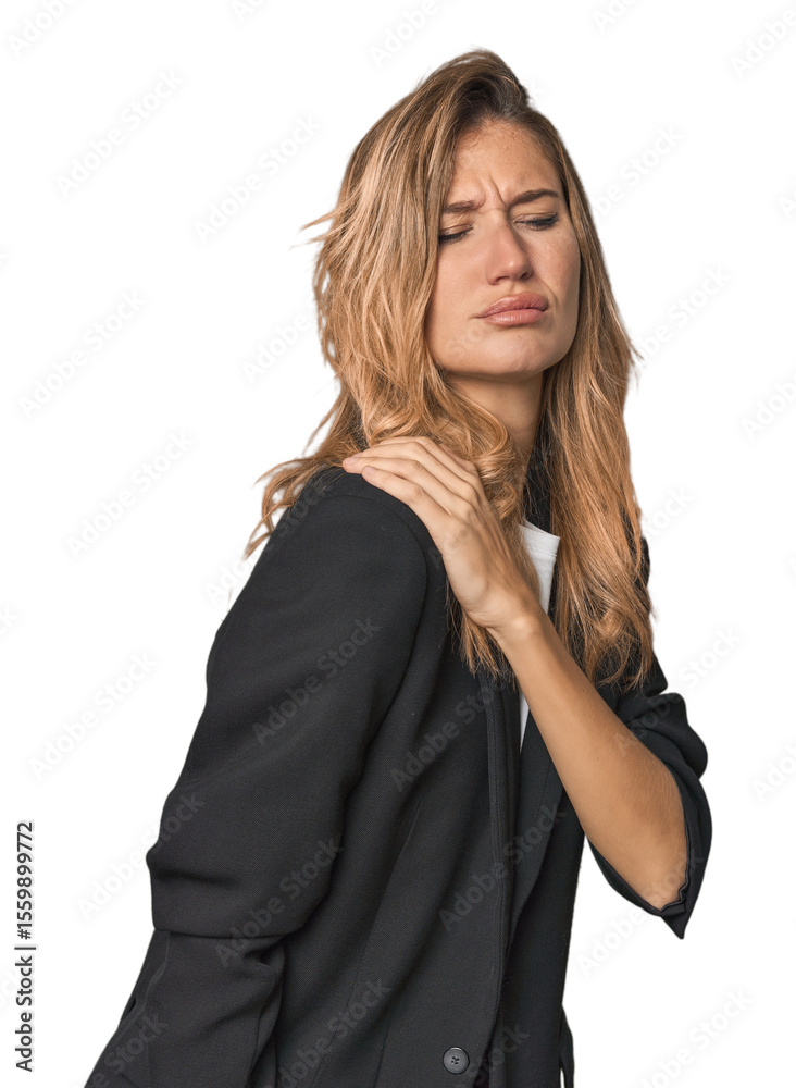 Naklejka premium Young businesswoman in a suit having a shoulder pain.