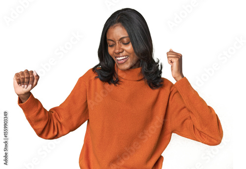 Portrait of a young Indian woman dancing and having fun.