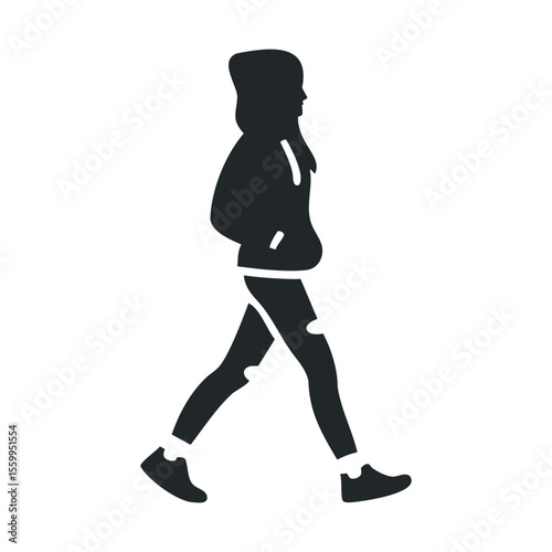 Silhouette of hooded person walking.