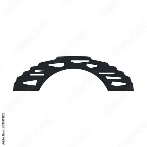 Silhouette of a historic stone bridge with arch design.