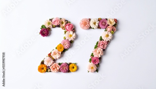 Number 27 made out of flowers with solid white background. Photo for twenty seventh birthday or anniversary party