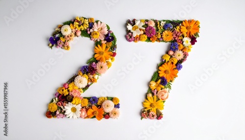 Number 27 made out of flowers with solid white background. Photo for twenty seventh birthday or anniversary party