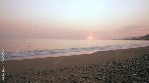 Tranquil Beach Sunset with Soft Waves