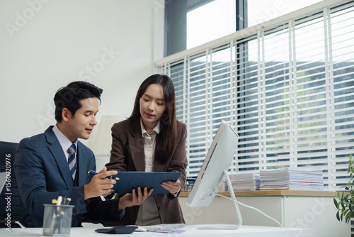Project manager working and update tasks with milestones progress planning and professional investor working new start up project in the office.