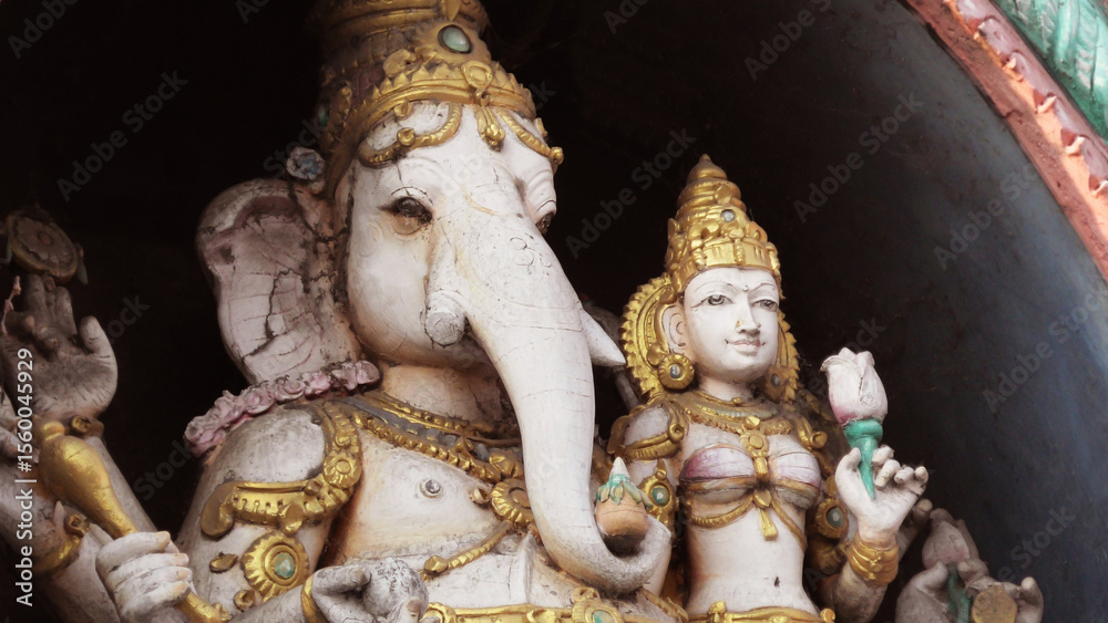 Fototapeta premium The Ganesha sculpture on the wall at Arunachalesvara Temple complex, Thiruvannamalai, Tamil Nadu, India