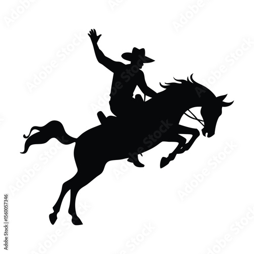 Striking black silhouette of a cowboy riding a bucking horse