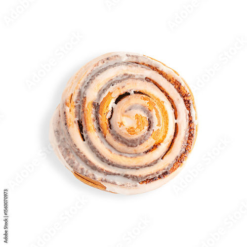 Top view of single delicious, freshly baked, sweet homemade cinnamon roll bun or swirl glazed with sugar icing isolated on white background served for morning breakfast as traditional dessert pastry