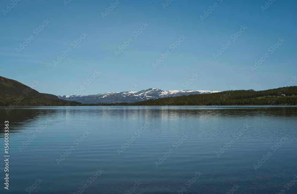 Fototapeta premium Mountain Reflection in Norway’s Blue Lake