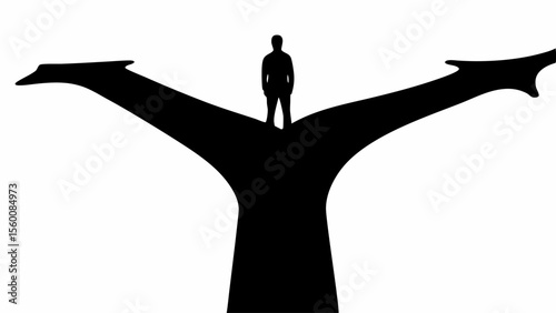 Silhouette of a person standing at a crossroads with two diverging paths in a black and white image