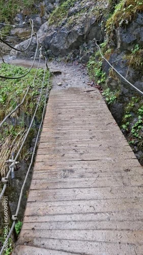 Walking a small path to the waterfall