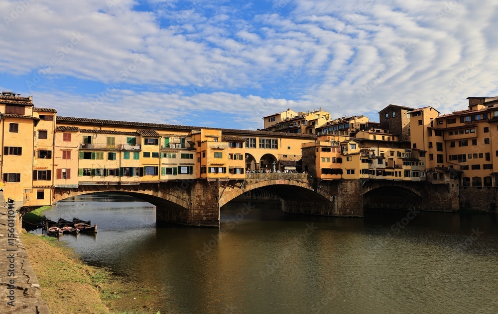 Fototapeta premium Ponte Vecchio in Florence with blue sky.