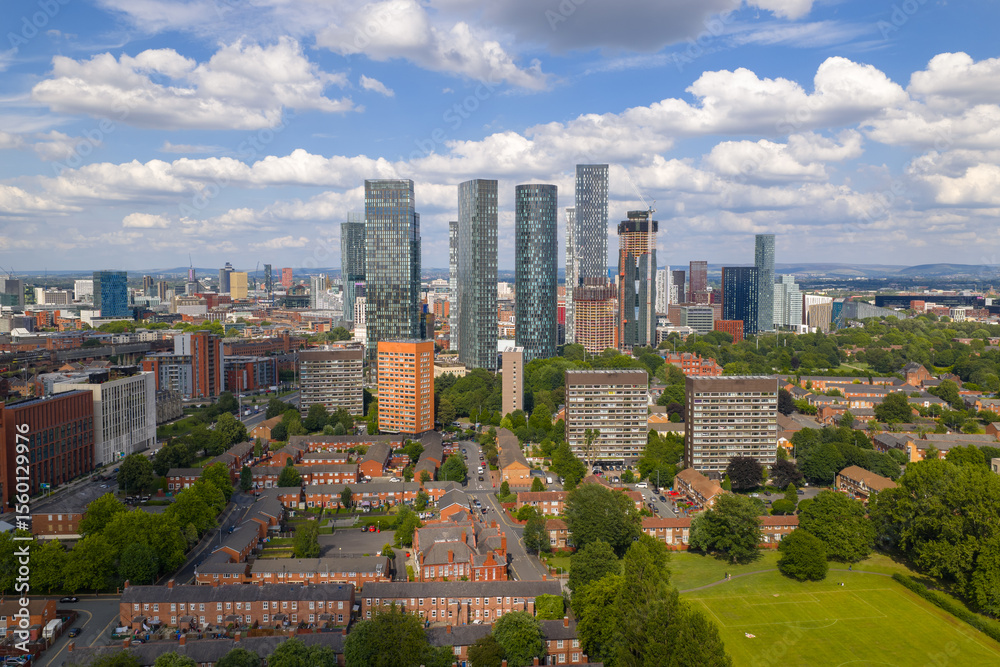 Naklejka premium Aerial image of the cloudy Manchester cityscape