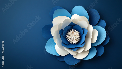Large white and blue paper flowers with layered petals, paper art style, dark blue background, handmade, decorative design.