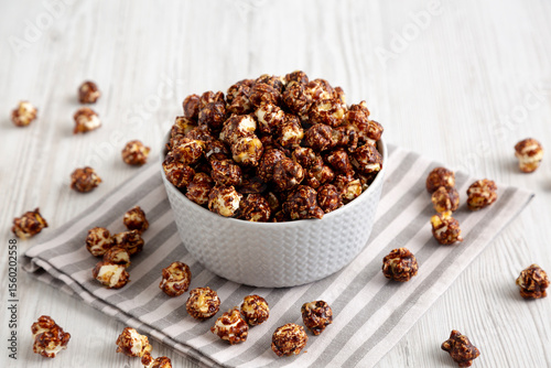 Homemade Chocolate Caramel Popcorn Ready to Eat in a Bowl, side view.