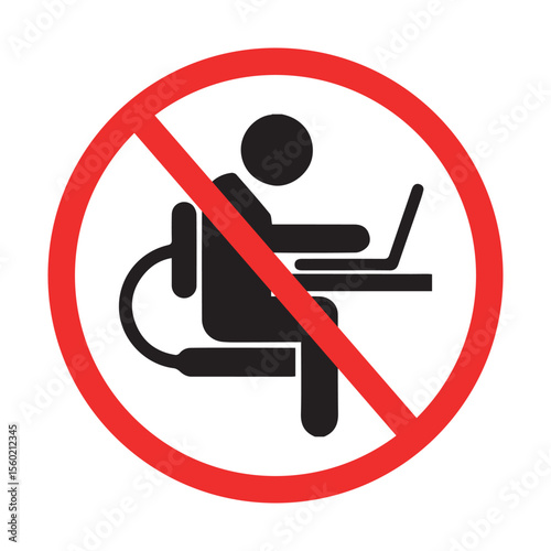 prohibition icon of person using laptop at desk, red circle with slash indicating no computer usage