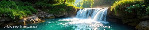 Serene Waterfall Cascading Down Lush Green Hillside in Sunlight Perfect for Travel, Nature, and Environmental Projects