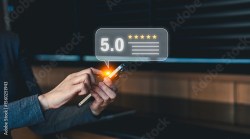 A person uses a smartphone to give a 5-star review, highlighting positive feedback and customer satisfaction through digital rating.