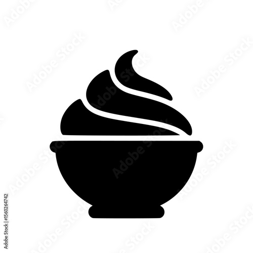 Delicious whipped topping in a bowl, perfect for dessert.