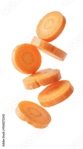 Fresh carrot slices floating mid air, showcasing their vibrant orange color and circular shape, perfect for healthy recipes and culinary