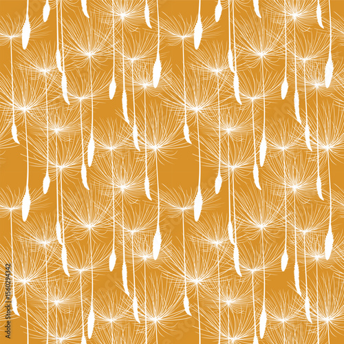 Seamless background from a dandelion. Flight of a dandelion, seeds fly from the wind